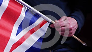 British citizen waving Union Jack flag