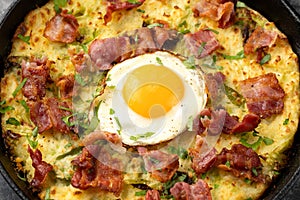 A British Classic, Bubble and Squeak baked with mashed potatoes with cabbage, bacon and eggs