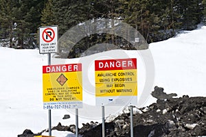 View of sign on Trans-Canada Highway `Danger. Avalanche Control using Explosives.