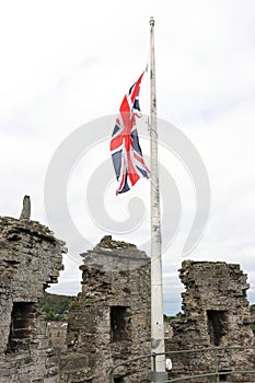 British flag at half mast on Conwy Castle