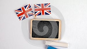 British flags. Small whiteboard with chalk