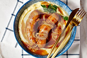 British food: pork sausage with gravy and mash