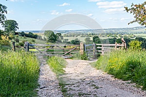 British landscape with rural road and gate