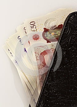 british money and calculator, notepad. Alan Turing 50 British pounds. photo