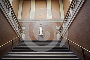 British Museum ancient stairway with Roman statue in London