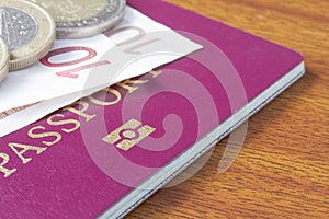 British passport with Euro coins