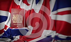 British passport on the flag of the UK United Kingdom. Getting a UK Great Britain passport,  naturalization and immigration