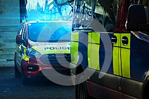 British police car with lights flashing