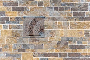 British Police Coats of Arms on brick wall in Daventry UK