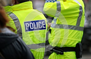 British police officers crowd control at a UK event photo