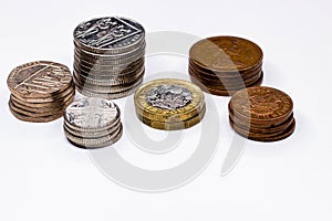 British pounds and pence coins on white background