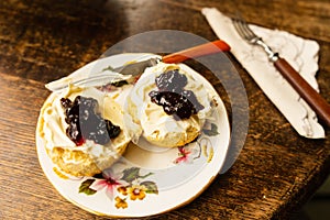 British scone with clotted cream and jam