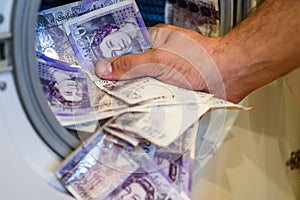 British Sterling Pounds Notes Taken Out of Washing Machine. Money Laundering Concept