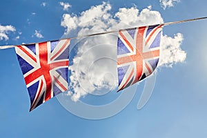 British Union Jack bunting flags against sky