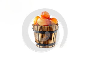 British Victoria Plums in Wooden Plant Pot isolated on White Background