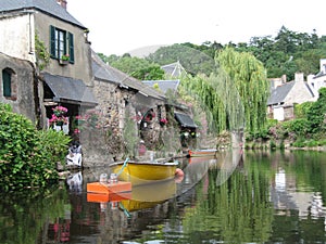 In Brittany, seen the picturesque houses with their flowery facades.