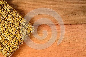 Brittles with sunflower seeds on a wooden table