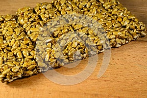 Brittles with sunflower seeds on the wooden table