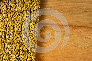 Brittles with sunflower seeds on a wooden table