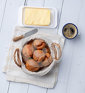 Broa, typical brazilian corn flour bread with butter and coffee