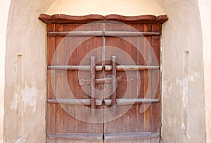 A broad ancient door in Riffa fort, Bahrain