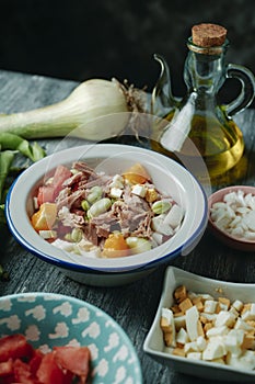 broad bean salad in a white enamel plate