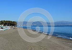 The broad sandy beach at the Spanish seaside resort of Torremolinos.