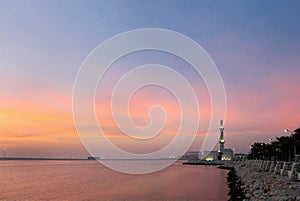 Broad view of mosque at Muharraq corniche during dusk , Bahrain