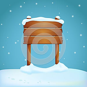 Broad wooden sign with two posts covered with snow on the snowy ground. Blue background with falling snowflakes.