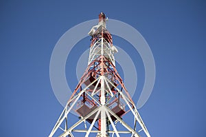 Broadcast relay station antenna over blue sky