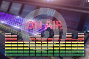 Broadcast studio on air. Media sound, radio and television record on professional audio panel blurred background.