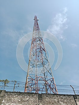Broadcast Tower Standing Tall in Blue Sky