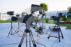 Broadcast tv; movie shooting or video production and film, tv crew team with camera