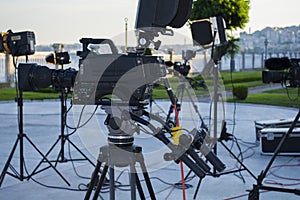 Broadcast tv; movie shooting or video production and film, tv crew team with camera