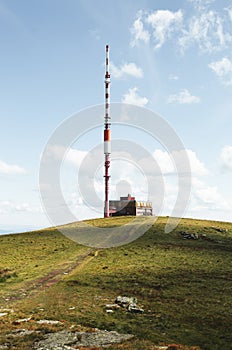 Broadcasting tower on the top of Kralova Hola mountain in Slovakia - Low Tatras. Beautiful and stunning scenic view of green