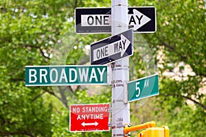 Broadway, 5th avenue and One Way Street Signs photo