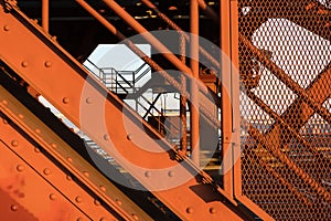 The Broadway Bridge in Portland painted red