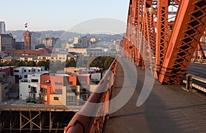 The Broadway Bridge in Portland painted red