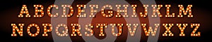 Broadway style orange light bulb alphabet. Vector