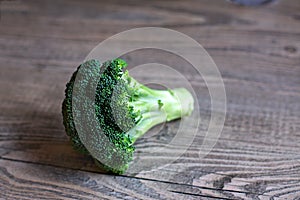 Broccoli Floret on Wood Table