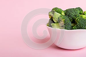 broccoli of fresh green broccoli in bowl over coloredbackground. , close up. Fresh vegetable