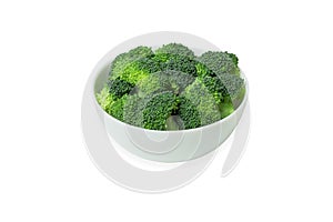 Broccoli fresh green pieces in a bowl isolated on white background
