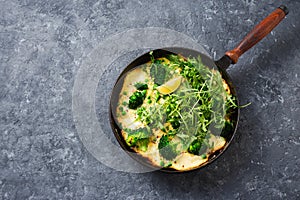 Broccoli green mozzarella cheese peas frittata frying pan top view