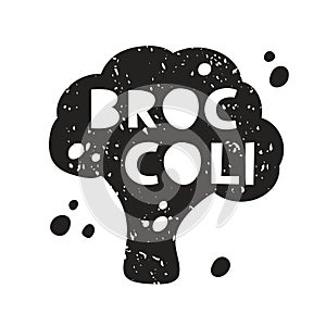 Broccoli grunge sticker. Black texture silhouette with lettering inside. Imitation of stamp, print with scuffs