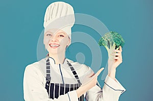 Broccoli has impressive nutritional profile. Woman chef hold broccoli vegetable. Healthy vegetarian recipes. Healthy