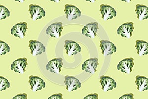 Broccoli slices on bright green background