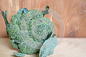 Broccoli and wood background