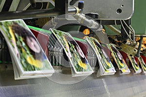 Brochure and magazine stitching process.