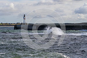 Brock Harbour Lighthouse on a stormy day, Fraserburgh, Aberdeenshire,Scotland,UK.