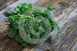 Brocoli babe bunch on wooden table